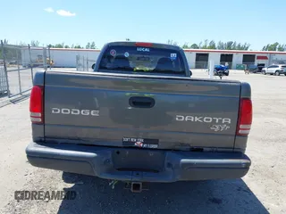 2003 Dodge Dakota with VIN 1D7FL16X53S361797, listed as a IAAI auction lot 42056555 with 243,771 mi miles and . Bid and sale history available at carsss.com. Image 17.