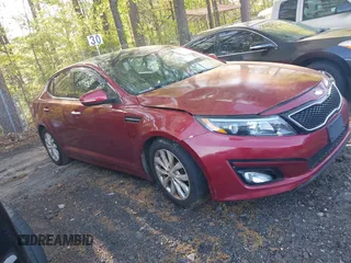 2015 Kia Optima EX with VIN 5XXGN4A70FG385182, listed as a IAAI auction lot 42005000 with 199,417 mi miles. Bid and sale history available at carsss.com. Image 1.