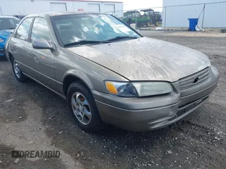 1999 Toyota Camry LE with VIN JT2BG22KXX0292807, listed as a IAAI auction lot 42768569 with 289,456 mi miles and . Bid and sale history available at DreamBid. Image 1.