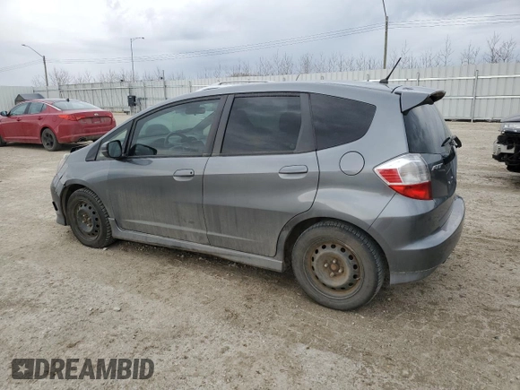 2013 Honda Fit Sport z VIN LUCGE8H70D3007465, wystawiony jako Copart lot #53542045 z przebiegiem 223 335 mil mil oraz Szkoda całkowita • Salvage title. Historia ofert i sprzedaży dostępna na DreamBid. Obrazek 2.