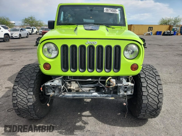 2012 Jeep Wrangler Unlimited Call of Duty MW3 z VIN 1C4BJWFG4CL242211, wystawiony jako Copart lot #59774555 z przebiegiem 117 463 mil mil oraz Szkoda całkowita • Salvage title. Historia ofert i sprzedaży dostępna na DreamBid. Obrazek 5.
