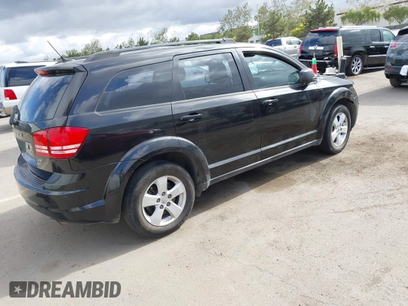2013 Dodge Journey American Value with VIN 3C4PDCAB2DT502182, listed as a IAAI auction lot 42074092 with 151,997 mi miles and . Bid and sale history available at DreamBid. Image 4.