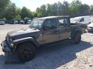 2021 Jeep Gladiator Freedom with VIN 1C6HJTAG4ML580023, listed as a Copart auction lot 57586475 with 64,022 mi miles and Salvage title. Bid and sale history available at DreamBid. Image 1.