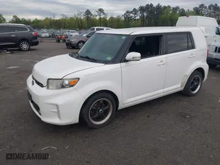 2014 Scion xB with VIN JTLZE4FE6EJ066349, listed as a IAAI auction lot 42045307 with 165,144 mi miles. Bid and sale history available at carsss.com. Image 17.