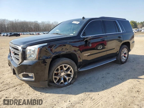 2015 GMC Yukon SLE with VIN 1GKS1AKC0FR228818, listed as a Copart auction lot 48677585 with 175,950 mi miles and Clean Title. Bid and sale history available at carsss.com. Image 1.