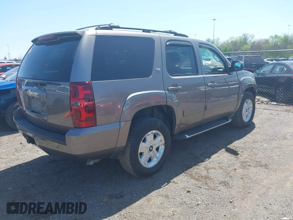 2013 Chevrolet Tahoe LT with VIN 1GNSKBE09DR325729, listed as a IAAI auction lot 41989587 with 186,361 mi miles and . Bid and sale history available at DreamBid. Image 4.