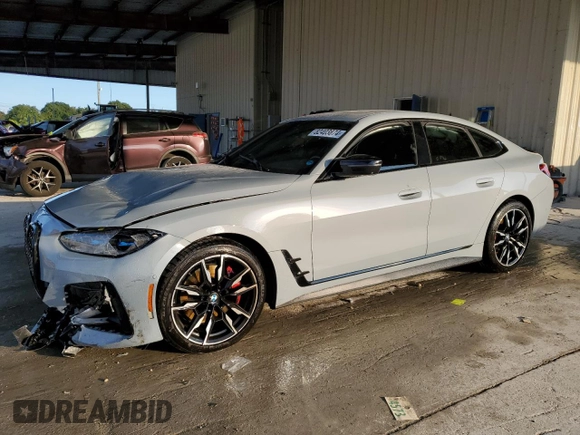 2022 BMW 4 Series M440i xDrive with VIN WBA13AW06NFM38130, listed as a Copart auction lot 82403874 with 49,302 mi miles and Salvage title. Bid and sale history available at DreamBid. Image 1.