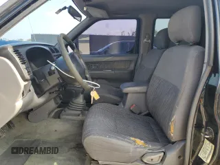 2000 Nissan Frontier XE with VIN 1N6ED27T7YC300373, listed as a Copart auction lot 55829535 with 301,305 mi miles and Salvage title. Bid and sale history available at DreamBid. Image 7.