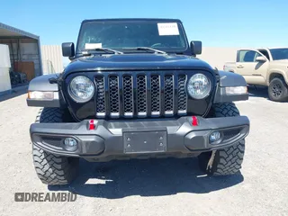 2023 Jeep Gladiator Rubicon z VIN 1C6JJTBG3PL531982, wystawiony jako IAAI lot #42211139 z przebiegiem 28 301 mil mil oraz . Historia ofert i sprzedaży dostępna na DreamBid. Obrazek 6.