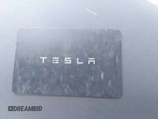 2022 Tesla Model Y Long Range z VIN 7SAYGDEE3NF426481, wystawiony jako IAAI lot #42076729 z przebiegiem 21 648 mil mil oraz . Historia ofert i sprzedaży dostępna na DreamBid. Obrazek 11.