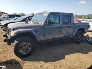 2023 Jeep Gladiator Rubicon with VIN 1C6JJTBG8PL550219, listed as a Copart auction lot 54627685 with 9,671 mi miles and Salvage title. Bid and sale history available at DreamBid. Image 1.