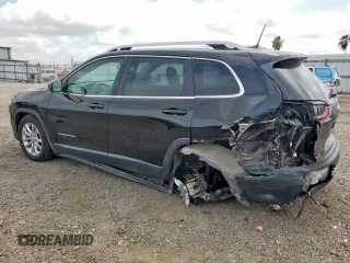2019 Jeep Cherokee Latitude with VIN 1C4PJLCB6KD264183, listed as a Copart auction lot 64871745 with 121,556 mi miles and Salvage title. Bid and sale history available at DreamBid. Image 2.
