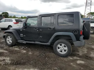 2008 Jeep Wrangler Unlimited X with VIN 1J4GA391X8L528349, listed as a Copart auction lot 57086935 with 134,061 mi miles and Salvage title. Bid and sale history available at DreamBid. Image 2.