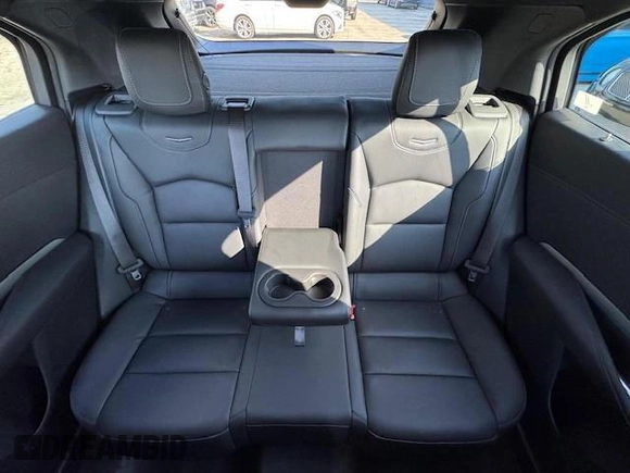 2023 Cadillac XT4 AWD Premium Luxury z VIN 1GYFZDR40PF108407, wystawiony jako Copart lot #47146185 z przebiegiem 8 724 mil mil oraz Nie do naprawy • Non repairable. Historia ofert i sprzedaży dostępna na DreamBid. Obrazek 9.