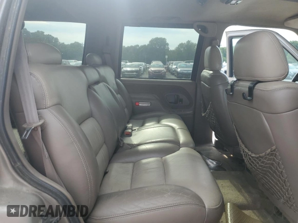 2000 Chevrolet Tahoe Z71 with VIN 1GNEK13R7YR189177, listed as a Copart auction lot 56830725 with 308,270 mi miles and Salvage title. Bid and sale history available at DreamBid. Image 11.