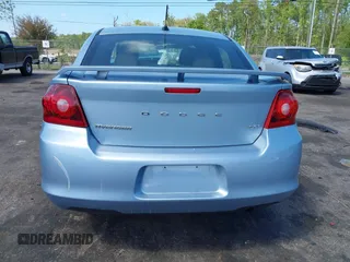 2013 Dodge Avenger SXT with VIN 1C3CDZCB0DN521591, listed as a IAAI auction lot 41891451 with 100,234 mi miles and . Bid and sale history available at carsss.com. Image 16.