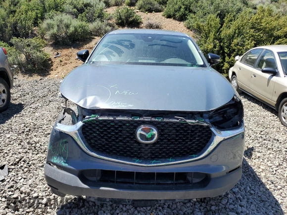 2023 Mazda CX-30 S Carbon Edition with VIN 3MVDMBCM1PM524019, listed as a Copart auction lot 57079355 with 46,737 mi miles and Salvage title. Bid and sale history available at DreamBid. Image 5.