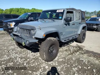 2015 Jeep Wrangler Unlimited Willys Wheeler with VIN 1C4BJWDG5FL609110, listed as a Copart auction lot 56013255 with 153,202 mi miles and Clean Title. Bid and sale history available at DreamBid. Image 1.