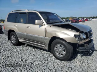 1999 Lexus LX 470 z VIN JT6HT00W1X0045075, wystawiony jako Copart lot #55684785 z przebiegiem 168 855 mil mil oraz Szkody całkowita. Historia ofert i sprzedaży dostępna na DreamBid. Obrazek 4.