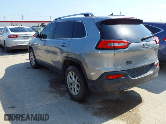 2014 Jeep Cherokee Latitude with VIN 1C4PJMCB4EW315520, listed as a IAAI auction lot 42034989 with 215,758 mi miles and . Bid and sale history available at DreamBid. Image 3.
