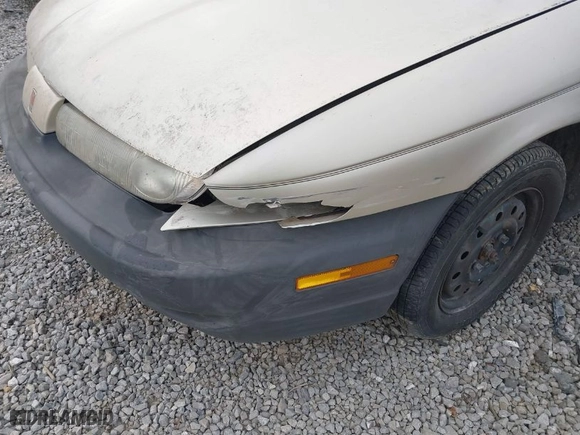 1999 Saturn SL with VIN 1G8ZH5282XZ273375, listed as a IAAI auction lot 41787290 with 230,397 mi miles. Bid and sale history available at carsss.com. Image 6.