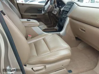 2006 Honda Pilot EX-L with VIN 5FNYF28566B010295, listed as a IAAI auction lot 41654433 with 302,539 mi miles. Bid and sale history available at carsss.com. Image 5.