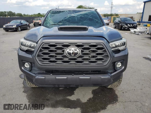2020 Toyota Tacoma SR5 z VIN 3TYDZ5BN9LT000209, wystawiony jako Copart lot #56127875 z przebiegiem 92 350 mil mil oraz Szkoda całkowita • Salvage title. Historia ofert i sprzedaży dostępna na DreamBid. Obrazek 5.