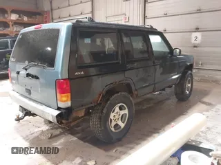 1998 Jeep Cherokee Sport z VIN 1J4FJ68S2WL142027, wystawiony jako IAAI lot #42305669 z przebiegiem 249 580 mil mil oraz . Historia ofert i sprzedaży dostępna na DreamBid. Obrazek 4.
