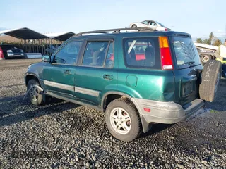 2000 Honda CR-V EX with VIN JHLRD1864YC025085, listed as a IAAI auction lot 41610450 with 249,573 mi miles. Bid and sale history available at carsss.com. Image 3.