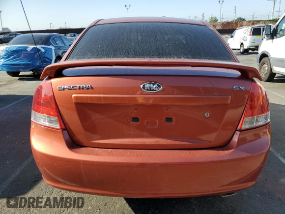 2009 Kia Spectra EX with VIN KNAFE222995027376, listed as a Copart auction lot 52406025 with 73,692 mi miles and Salvage Title. Bid and sale history available at DreamBid. Image 6.
