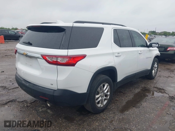 2019 Chevrolet Traverse LT Cloth z VIN 1GNERGKW2KJ128010, wystawiony jako IAAI lot #42173006 z przebiegiem 93 328 mil mil oraz . Historia ofert i sprzedaży dostępna na DreamBid. Obrazek 4.