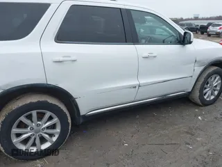 2015 Dodge Durango SXT with VIN 1C4RDJAG4FC760713, listed as a IAAI auction lot 41707354 with 174,216 mi miles and . Bid and sale history available at carsss.com. Image 6.