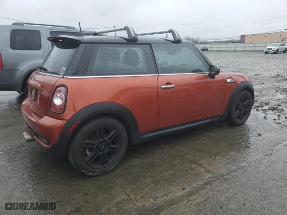 2011 MINI Cooper Hardtop S with VIN WMWSV3C5XBTY23889, listed as a Copart auction lot 52144945 with 68,311 mi miles and Salvage Title. Bid and sale history available at carsss.com. Image 3.