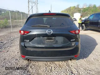2018 Mazda CX-5 Grand Touring with VIN JM3KFBDM2J0463279, listed as a IAAI auction lot 42115309 with 68,851 mi miles. Bid and sale history available at carsss.com. Image 16.