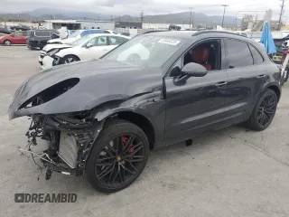 2022 Porsche Macan Turbo z VIN WP1AF2A57NLB30418, wystawiony jako Copart lot #53658525 z przebiegiem Nie podano mil oraz Szkoda całkowita • Salvage title. Historia ofert i sprzedaży dostępna na DreamBid. Obrazek 1.