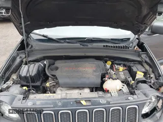 2016 Jeep Renegade Sport with VIN ZACCJBATXGPC85695, listed as a IAAI auction lot 42010070 with 131,839 mi miles. Bid and sale history available at carsss.com. Image 10.