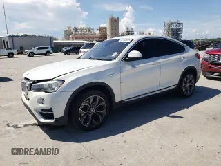 2015 BMW X4 xDrive28i with VIN 5UXXW3C51F0M88016, listed as a Copart auction lot 62142695 with 118,904 mi miles and Salvage title. Bid and sale history available at DreamBid. Image 1.