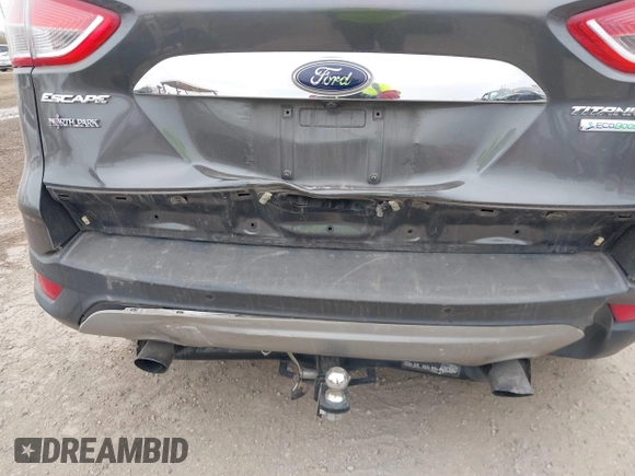 2016 Ford Escape Titanium with VIN 1FMCU0J9XGUC58149, listed as a IAAI auction lot 41739005 with 111,594 mi miles. Bid and sale history available at carsss.com. Image 16.