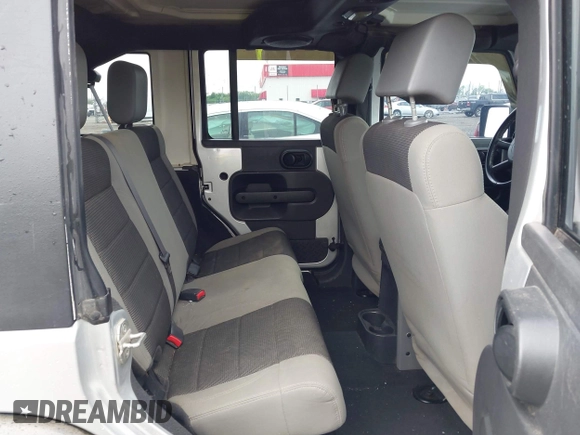 2007 Jeep Wrangler Unlimited X with VIN 1J4GA39187L209448, listed as a IAAI auction lot 42104328 with 138,302 mi miles and . Bid and sale history available at DreamBid. Image 8.