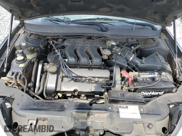 2002 Mercury Sable LS Premium with VIN 1MEHM55S02A621328, listed as a Copart auction lot 59556805 with 183,594 mi miles and Salvage title. Bid and sale history available at DreamBid. Image 11.