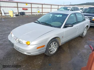 2000 Saturn SL with VIN 1G8ZJ527XYZ218993, listed as a IAAI auction lot 41603358 with 237,150 mi miles. Bid and sale history available at carsss.com. Image 2.