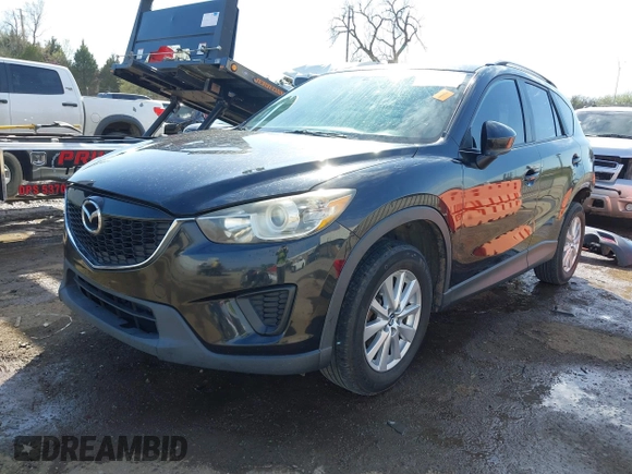 2014 Mazda CX-5 Sport with VIN JM3KE4BE6E0388909, listed as a IAAI auction lot 41876514 with 196,882 mi miles. Bid and sale history available at carsss.com. Image 19.