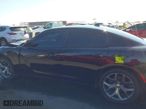 2015 Dodge Charger SXT z VIN 2C3CDXHG5FH784907, wystawiony jako IAAI lot #42322979 z przebiegiem 73 485 mil mil oraz . Historia ofert i sprzedaży dostępna na DreamBid. Obrazek 14.