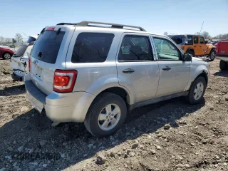 2010 Ford Escape XLS with VIN 1FMCU9C70AKC85380, listed as a Copart auction lot 52868005 with 302,211 mi miles and Clean title. Bid and sale history available at DreamBid. Image 3.