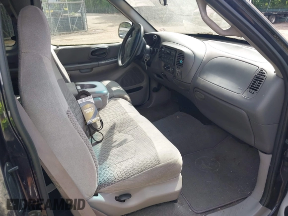 1999 Ford F-150 with VIN 1FTRX17W8XNA20352, listed as a IAAI auction lot 42485616 with 208,142 mi miles and . Bid and sale history available at DreamBid. Image 5.