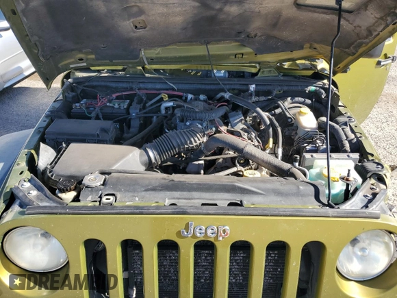 2008 Jeep Wrangler Rubicon z VIN 1J8GA69158L561579, wystawiony jako Copart lot #57525905 z przebiegiem 201 550 mil mil oraz Szkoda całkowita • Salvage title. Historia ofert i sprzedaży dostępna na DreamBid. Obrazek 11.