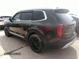 2020 Kia Telluride SX with VIN 5XYP5DHC7LG003935, listed as a IAAI auction lot 32399947 with 82,256 mi miles and . Bid and sale history available at DreamBid. Image 3.