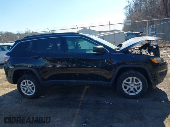 2021 Jeep Compass Freedom with VIN 3C4NJDAB0MT556781, listed as a IAAI auction lot 41601405 with 42,783 mi miles and . Bid and sale history available at carsss.com. Image 13.