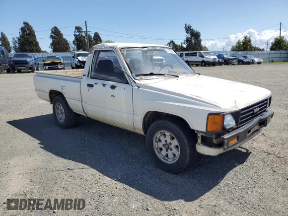 1985 Toyota Pickup z VIN JT4RN50R4F0068265, wystawiony jako Copart lot #51827965 z przebiegiem 348 047 mil mil oraz Szkoda całkowita • Salvage title. Historia ofert i sprzedaży dostępna na DreamBid. Obrazek 4.
