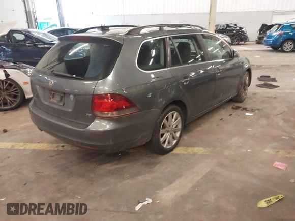 2014 Volkswagen Jetta SportWagen TDI w/Sunroof & Nav with VIN 3VWPL7AJ2EM627998, listed as a IAAI auction lot 41614718 with 134,203 mi miles. Bid and sale history available at carsss.com. Image 4.